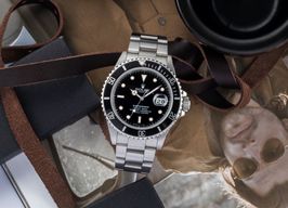 Rolex Submariner Date 168000 (1988) - Zwart wijzerplaat 40mm Staal