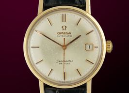 Omega Seamaster 166.020 (1965) - White dial 34 mm Yellow Gold case