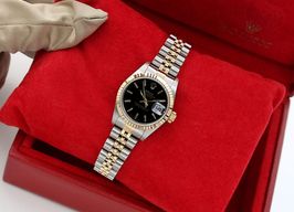 Rolex Lady-Datejust 69173 (Onbekend (willekeurig serienummer)) - Zwart wijzerplaat 26mm Goud/Staal