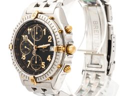 Breitling Chronomat B13050.1 (Onbekend (willekeurig serienummer)) - Zwart wijzerplaat 39mm Goud/Staal