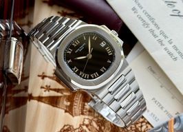 Patek Philippe Nautilus 3800 (1996) - Black dial 37 mm Steel case