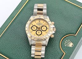 Rolex Daytona 16523 (Onbekend (willekeurig serienummer)) - 40mm Goud/Staal