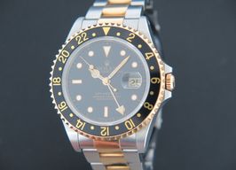 Rolex GMT-Master 16713 (1992) - Black dial 40 mm Gold/Steel case