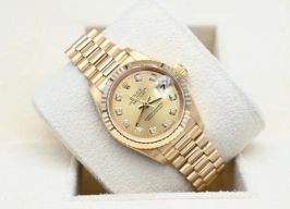 Rolex Lady-Datejust 69178 (1993) - Champagne wijzerplaat 26mm Geelgoud