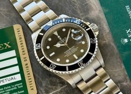Rolex Submariner Date 16610T (2009) - Zwart wijzerplaat 40mm Staal