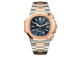 Patek Philippe Nautilus 5980/1AR-001 (2021) - Blauw wijzerplaat 40mm Goud/Staal