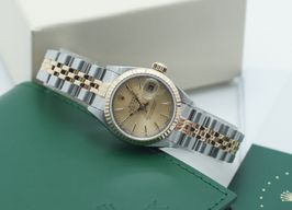 Rolex Lady-Datejust 69173 (1985) - Champagne wijzerplaat 26mm Goud/Staal