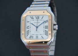 Cartier Santos W2SA0009 (2021) - Silver dial 40 mm Gold/Steel case