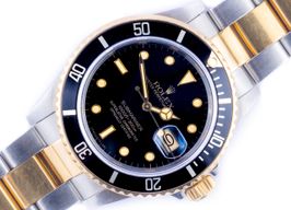 Rolex Submariner Date 16803 (1984) - Zwart wijzerplaat 40mm Goud/Staal