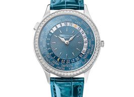 Patek Philippe World Time 7130G-016 (2023) - Blauw wijzerplaat 36mm Witgoud