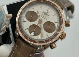 Omega Speedmaster 324.28.38.50.02.002 (2024) - Bruin wijzerplaat 38mm Goud/Staal