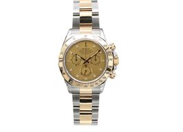 Rolex Daytona 116523 (Onbekend (willekeurig serienummer)) - 40mm Goud/Staal