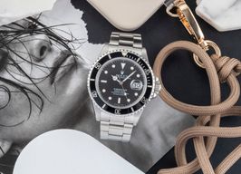 Rolex Submariner Date 168000 (1987) - Zwart wijzerplaat 40mm Staal