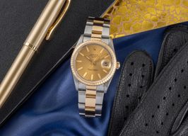 Rolex Oyster Perpetual Date 15223 (1993) - 34mm Goud/Staal