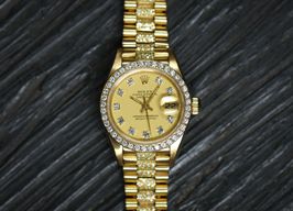 Rolex Lady-Datejust 69138 (1988) - Champagne wijzerplaat 26mm Geelgoud