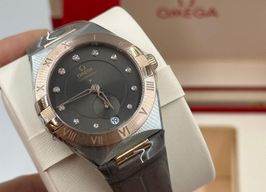 Omega Constellation 131.23.34.20.63.001 (2026) - Brown dial 34 mm Gold/Steel case