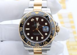 Rolex GMT-Master II 116713LN (Onbekend (willekeurig serienummer)) - Zwart wijzerplaat 40mm Goud/Staal