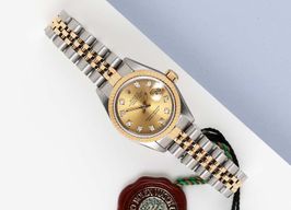 Rolex Lady-Datejust 69173 (1994) - Champagne wijzerplaat 26mm Goud/Staal