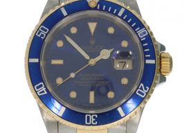 Rolex Submariner Date 16613 (1993) - Blauw wijzerplaat 40mm Goud/Staal