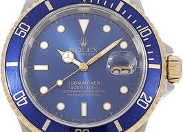 Rolex Submariner Date 16613 (Unknown (random serial)) - Blue dial 40 mm Gold/Steel case