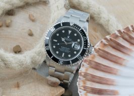 Rolex Submariner Date 16610T (2005) - Zwart wijzerplaat 40mm Staal