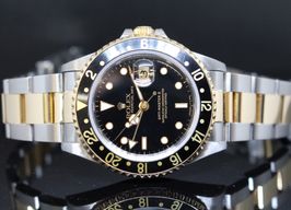 Rolex GMT-Master II 16713 (1994) - Black dial 40 mm Gold/Steel case