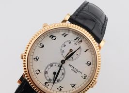 Patek Philippe Travel Time 5034 (2010) - White dial 35 mm Rose Gold case