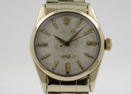 Rolex Oyster Perpetual 34 6634 (1955) - Silver dial 34 mm Gold/Steel case