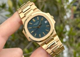 Patek Philippe Nautilus 3800 (1994) - Yellow dial 38 mm Yellow Gold case