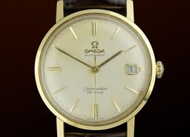 Omega Seamaster 166.020 (1963) - White dial 34 mm Yellow Gold case